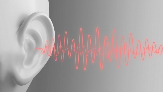 Une onde sonore pénétrant dans une oreille.
