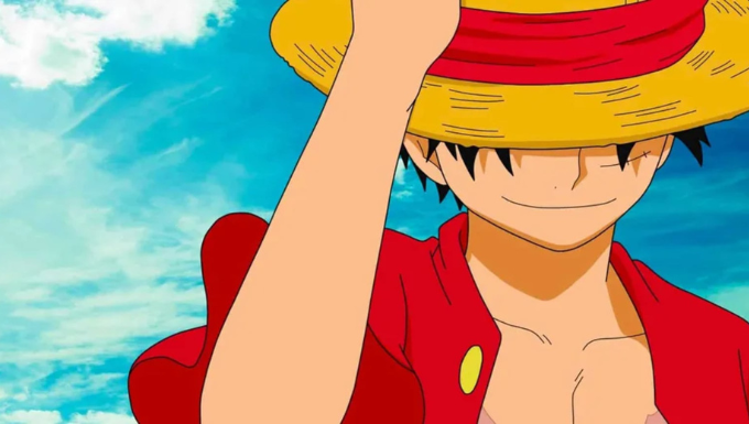 Luffy héros de One piece en gros plan, souriant sous son chapeau