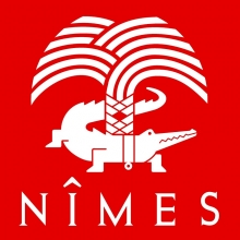 Logo de la Ville de Nîmes : palmier de sinople, au tronc duquel est attaché, avec une chaîne d'or, un crocodile passant